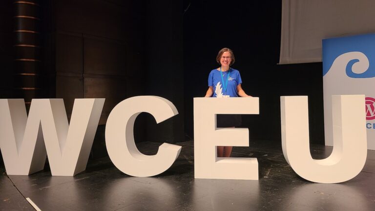 Ruth Kalinka with WCEU sign in Athens 2023